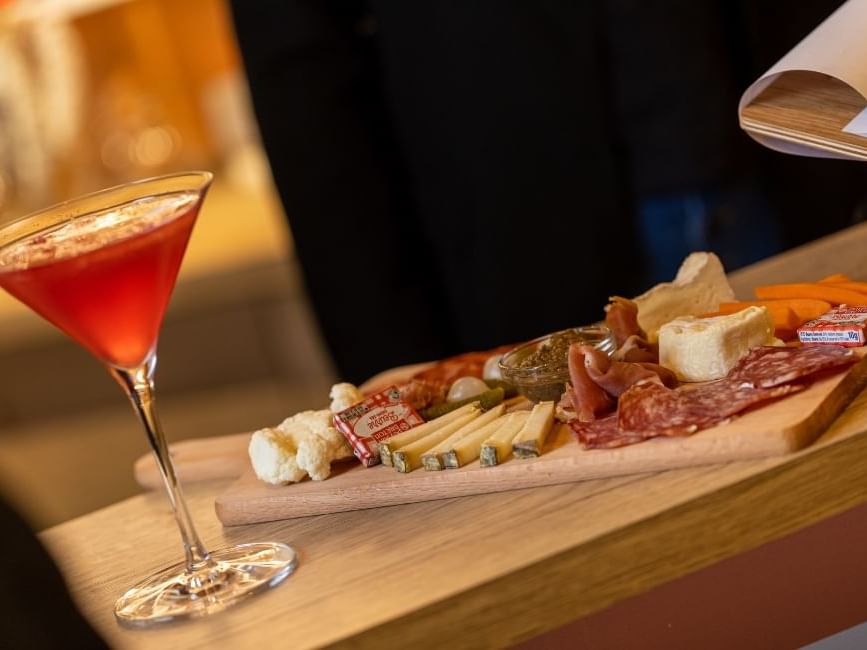 Close-up of breakfast tray with juice glass at Originals Hotel