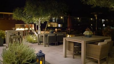 Loungers by the fire pit on the patio at The Nest Palo Alto