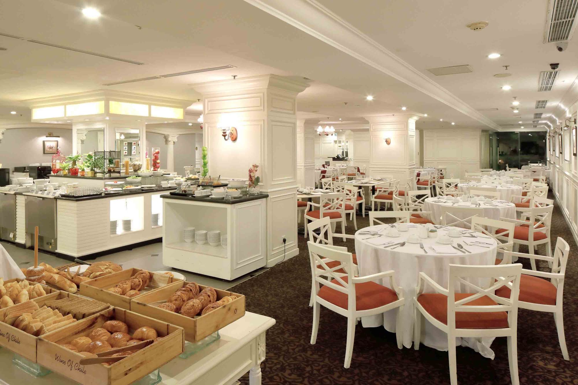 Breakfast buffet by the dining area in The Restaurant at Sunway Hotel Hanoi