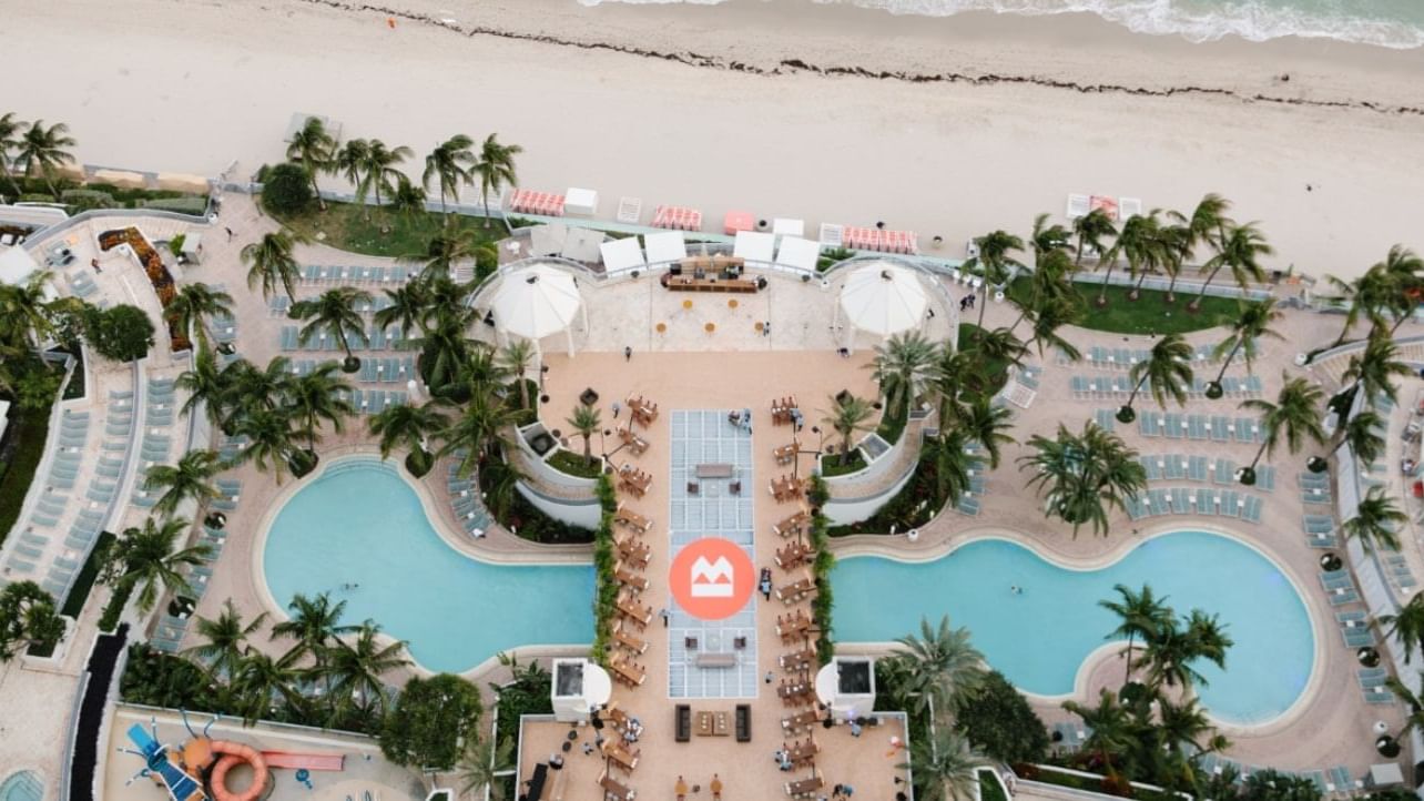 High-angle view of Infinity Pool with beach at The Diplomat Resort