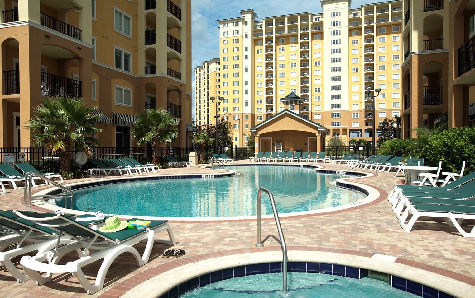 Relaxation Pool with sun loungers at Lake Buena Vista Resort Village and Spa