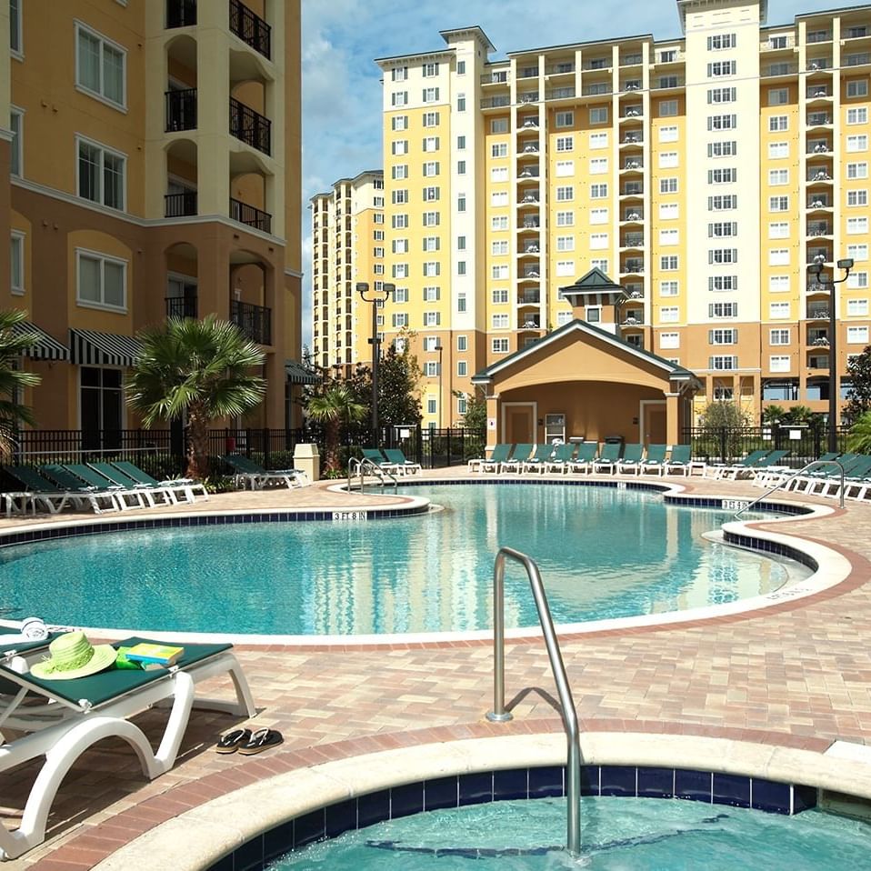 Relaxation Pool with sun loungers at Lake Buena Vista Resort Village and Spa