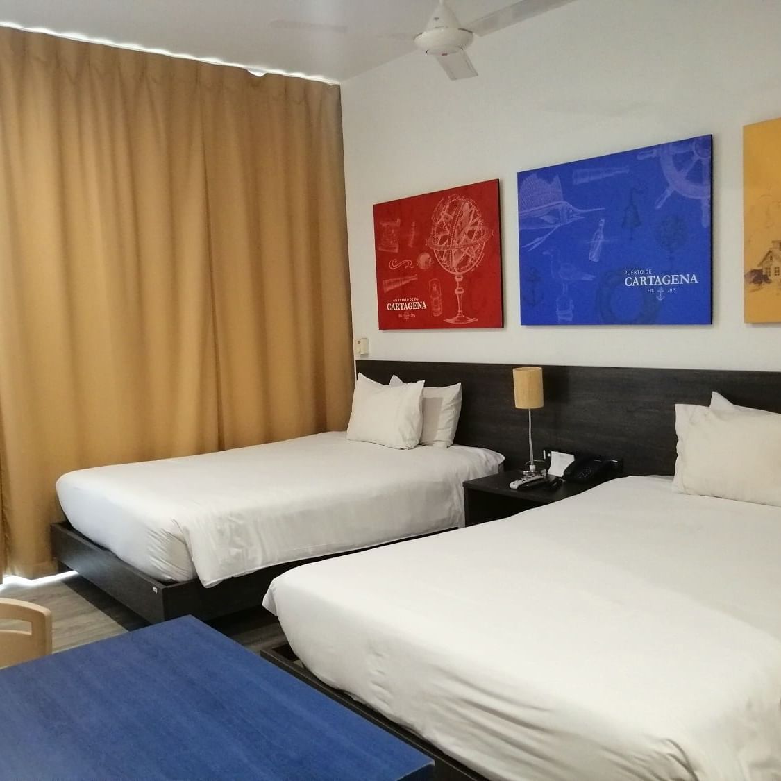 Interior of a bedroom at Hotel CLC Mamonal Cartagena