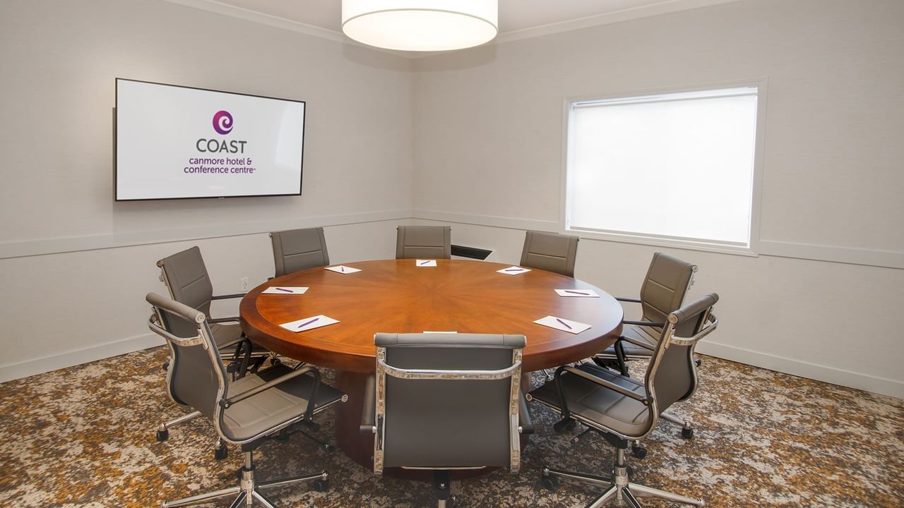 Conference room with round table.
