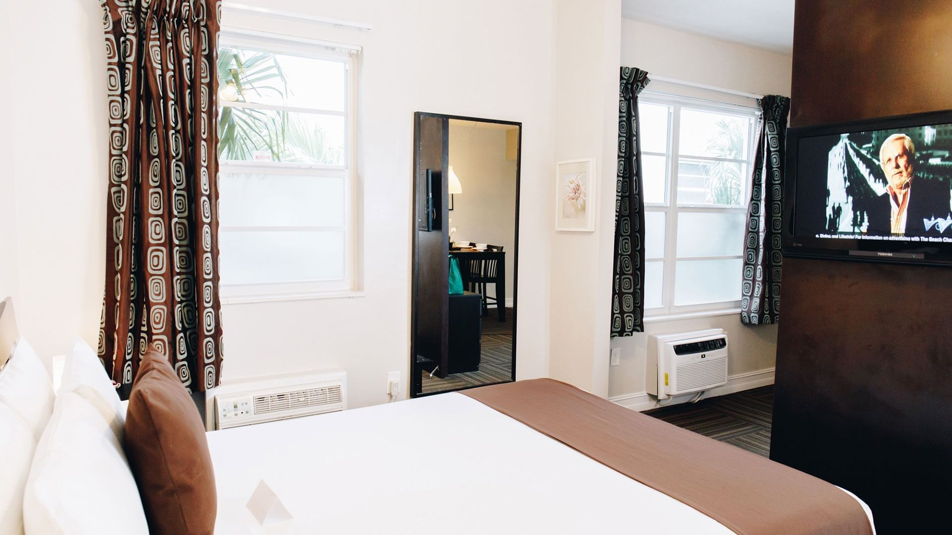 Bedroom arrangement in Queen suite at DOT Hotels