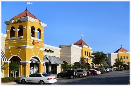 Street with shops and parking area near Lake Buena Vista Resort Village & Spa