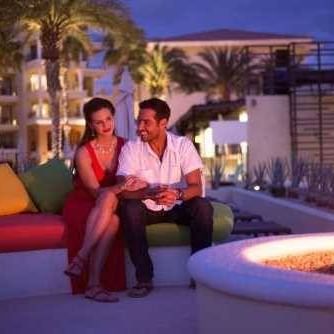 Portrait of a Couple by the fire at Casa Dorada Los Cabos
