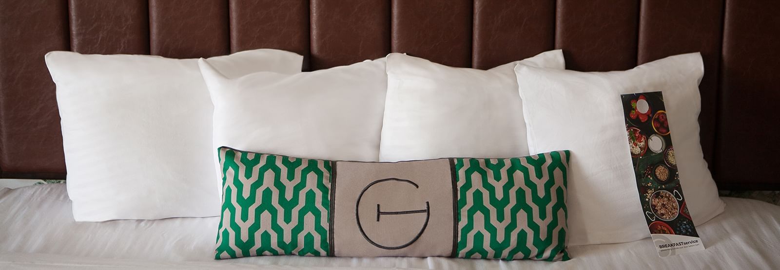 Close-up of pillows in King Deluxe bedroom at The Grove Hotel