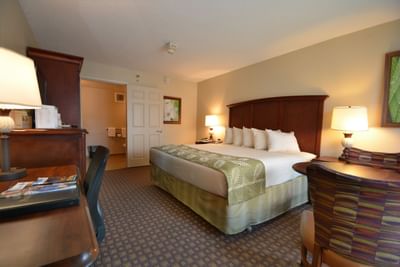 King bed and work desk in ADA Room at Rosen Inn Closest to Universal