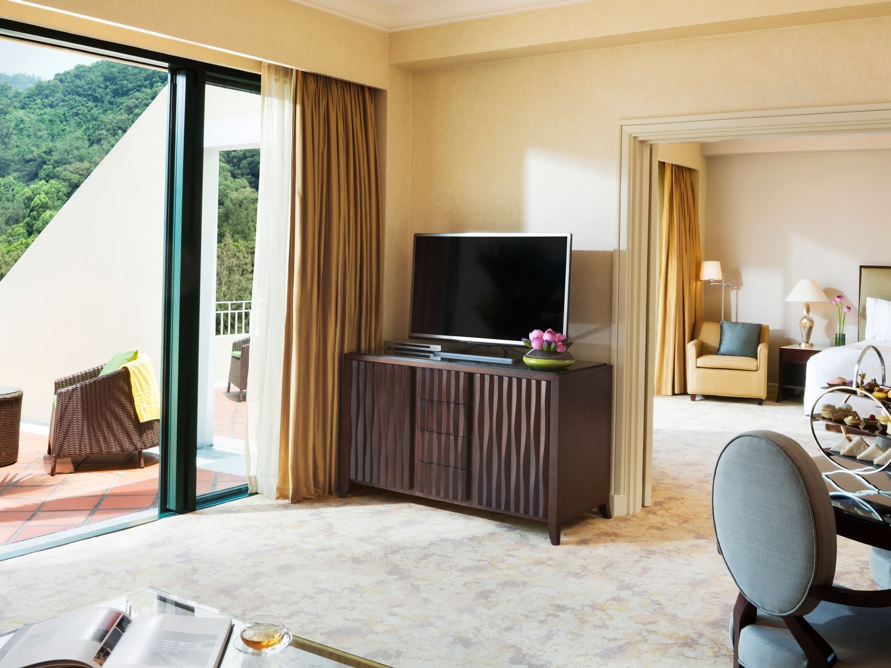 TV & living area in Deluxe Suite at Grand Coloane Resort
