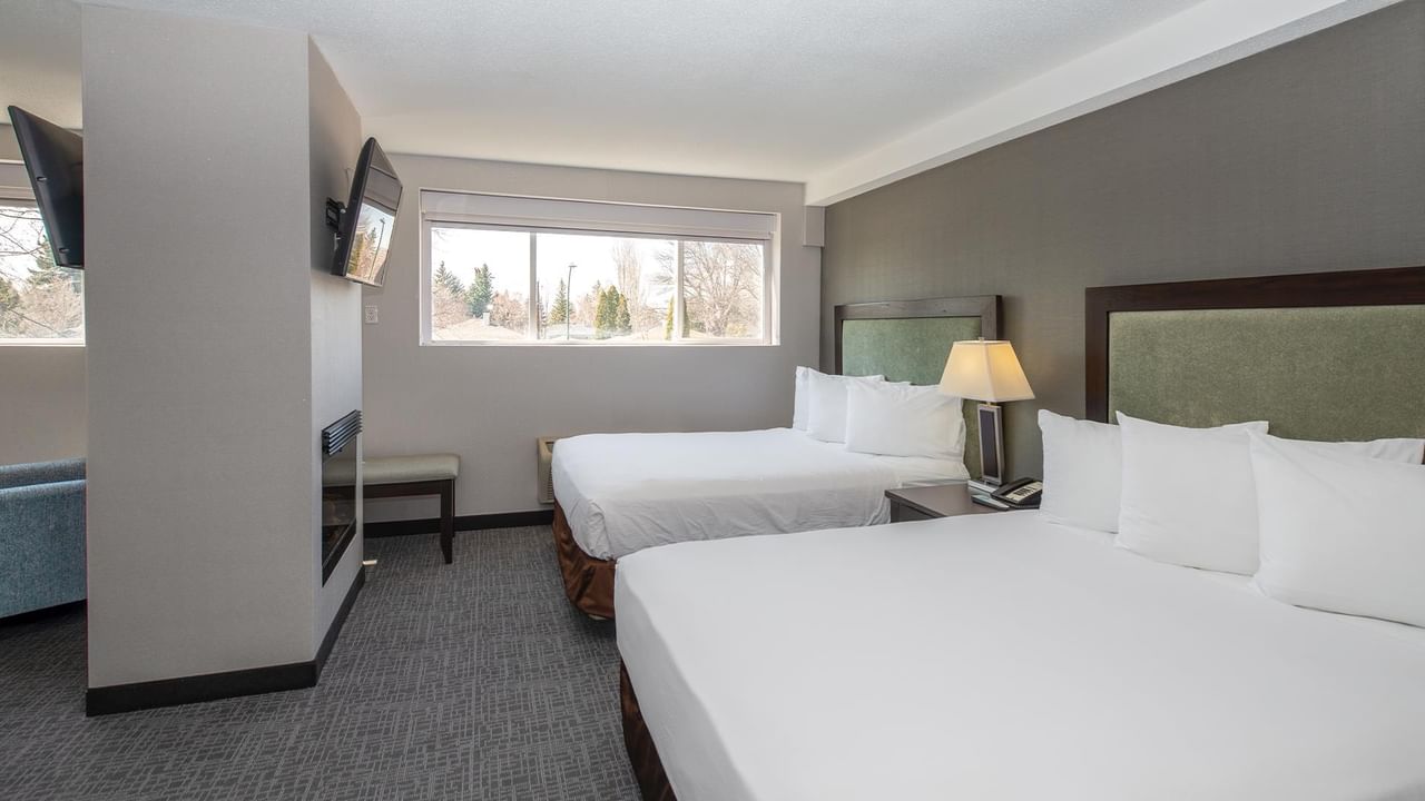 Two queen beds and a TV