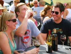 a group of people having a drink