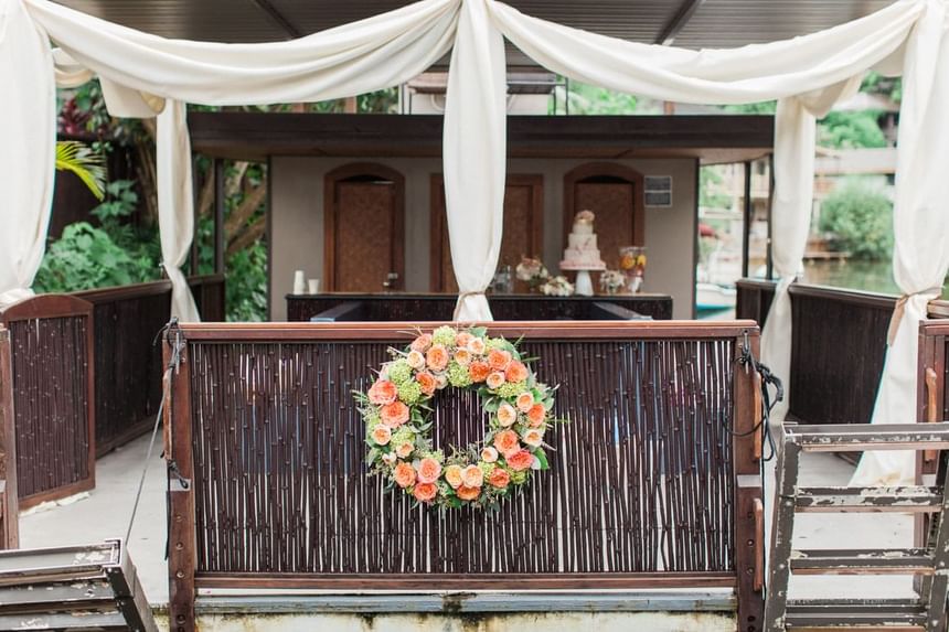 Wedding reception table arranged outdoors at Paradise Bay Resort