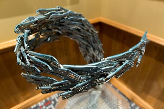 Closeup on a steel sculpture placed at Retro Suites Hotel