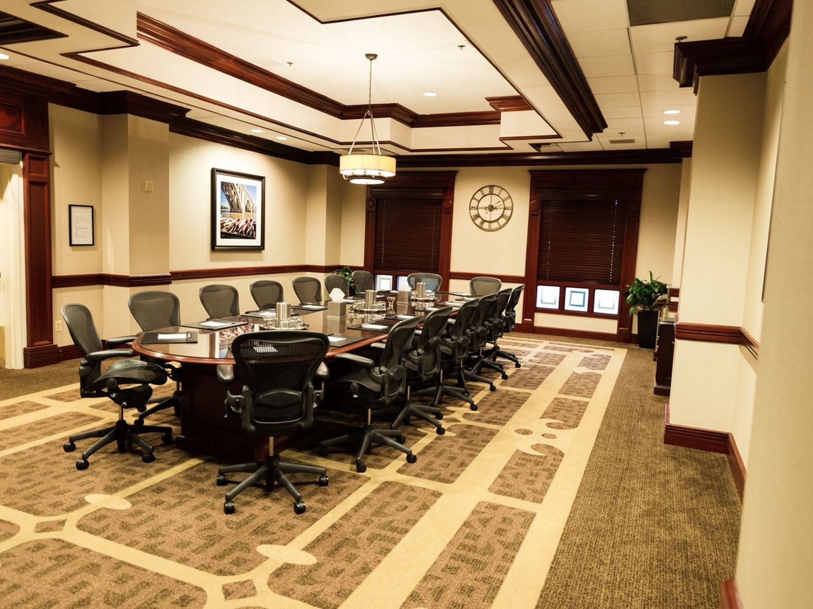 conference table in spacious room with carpet