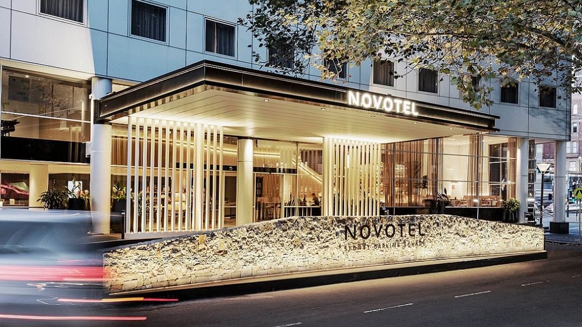 Illuminated exterior of Novotel Sydney Darling Square