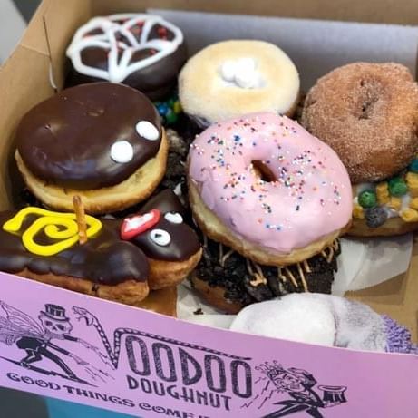 an assortment of donuts in a box
