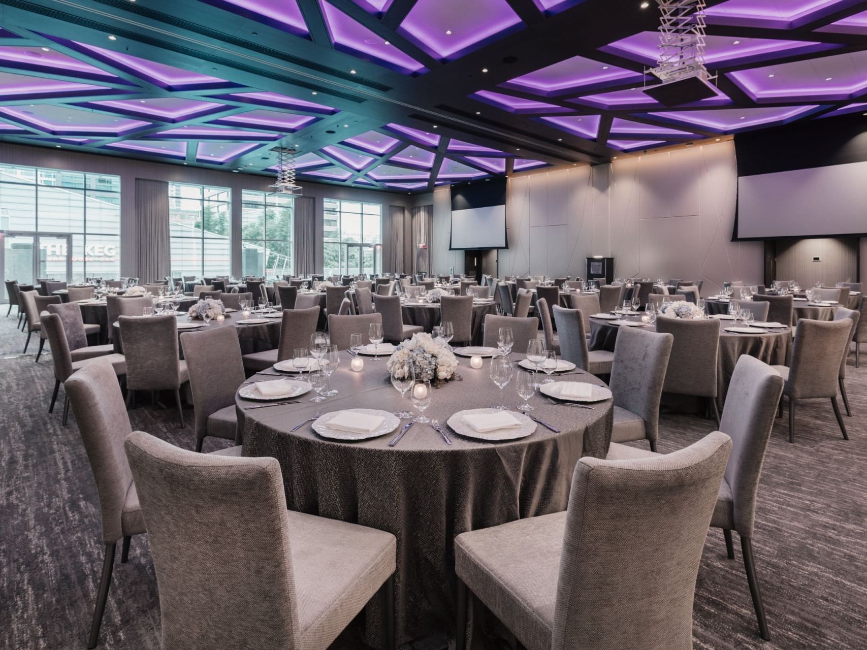 Banquet tables arranged at the Grand Ballroom in Paradox Resort