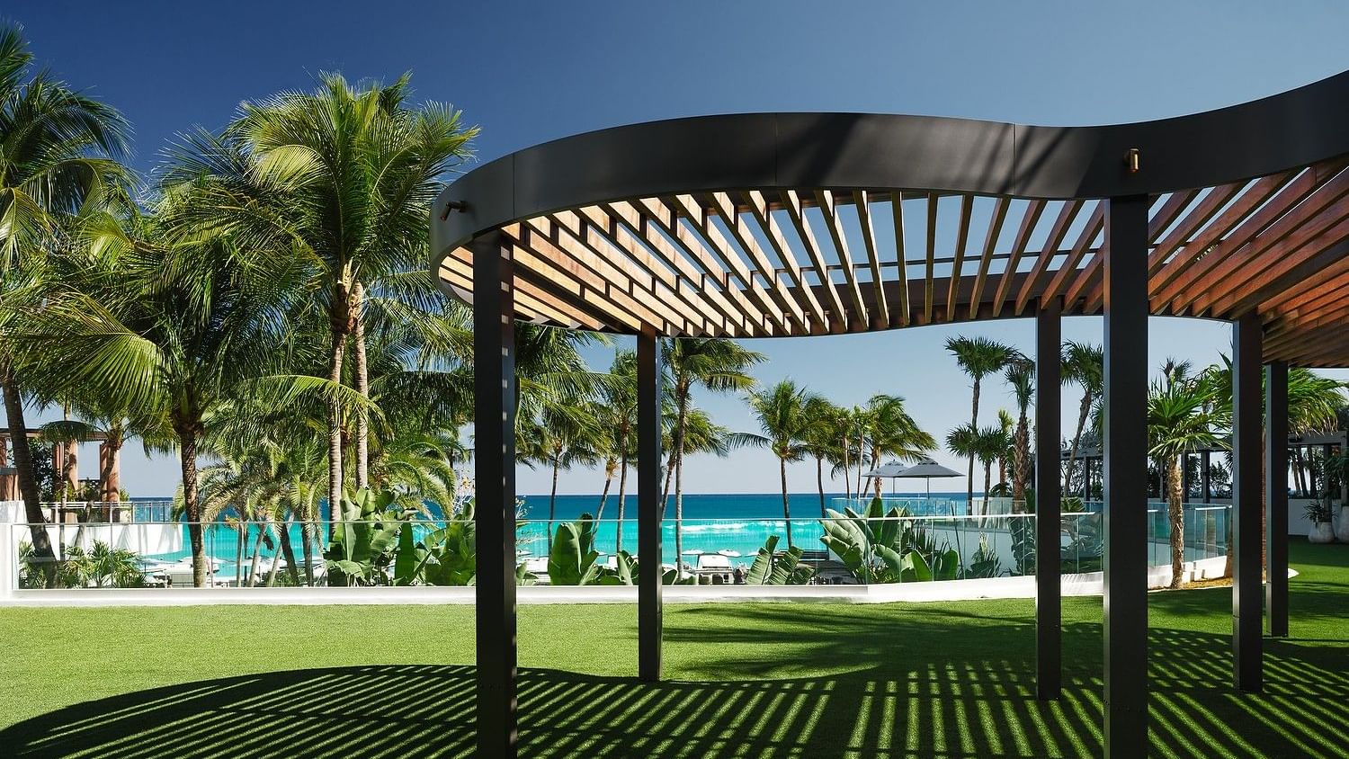 Lush oceanfront event lawn with panoramic views of the Atlantic Ocean.