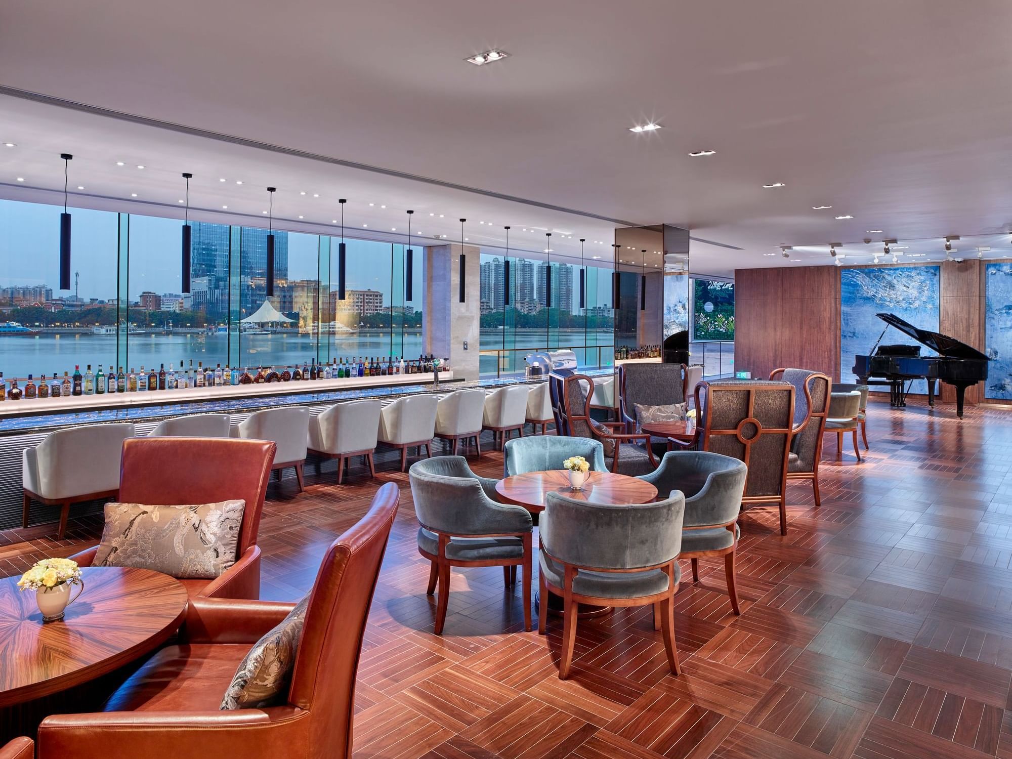 Lobby Lounge dining area with a city view at White Swan Hotel