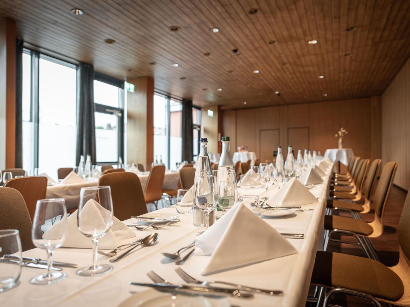 Dining table set-up in Uetli Hall at Best Western Spirgarten​​