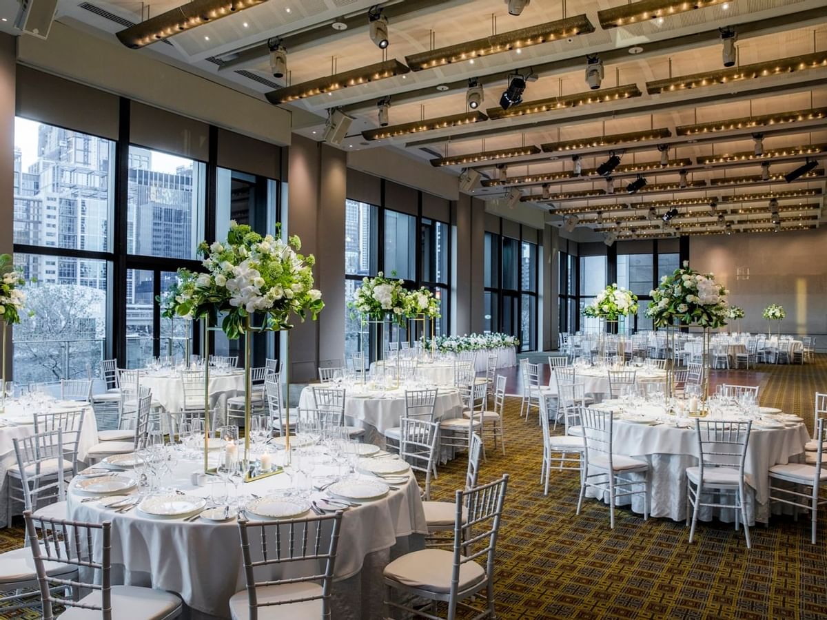 Banquet tables arranged in River Room at Crown Hotel Melbourne