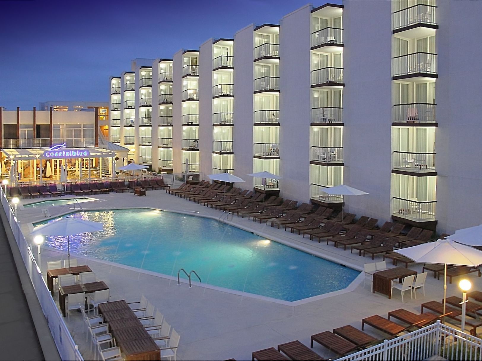 Pool area of our Diamond Beach NJ hotel at night