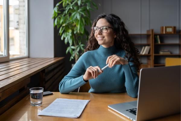 Women working from home as part of her company's culture of wellbeing programme 