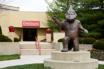 Dinosaur statue at the entrance of The IowaStater Restaurant