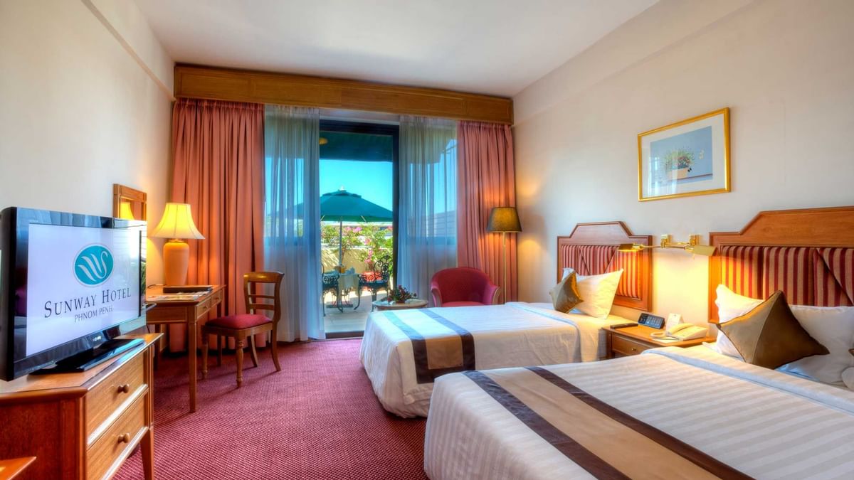 Wall-mounted water dispenser with a bottle in Deluxe Plus Twin at Sunway Hotel Big Box