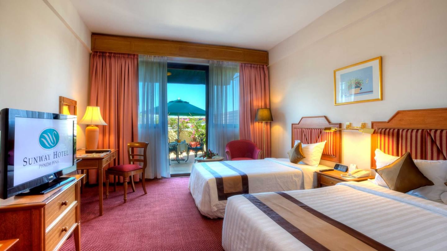 Wall-mounted water dispenser with a bottle in Deluxe Plus Twin at Sunway Hotel Big Box