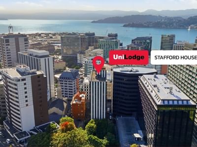 Aerial view of a cityscape with UniLodge Stafford House pinpointed among other buildings.