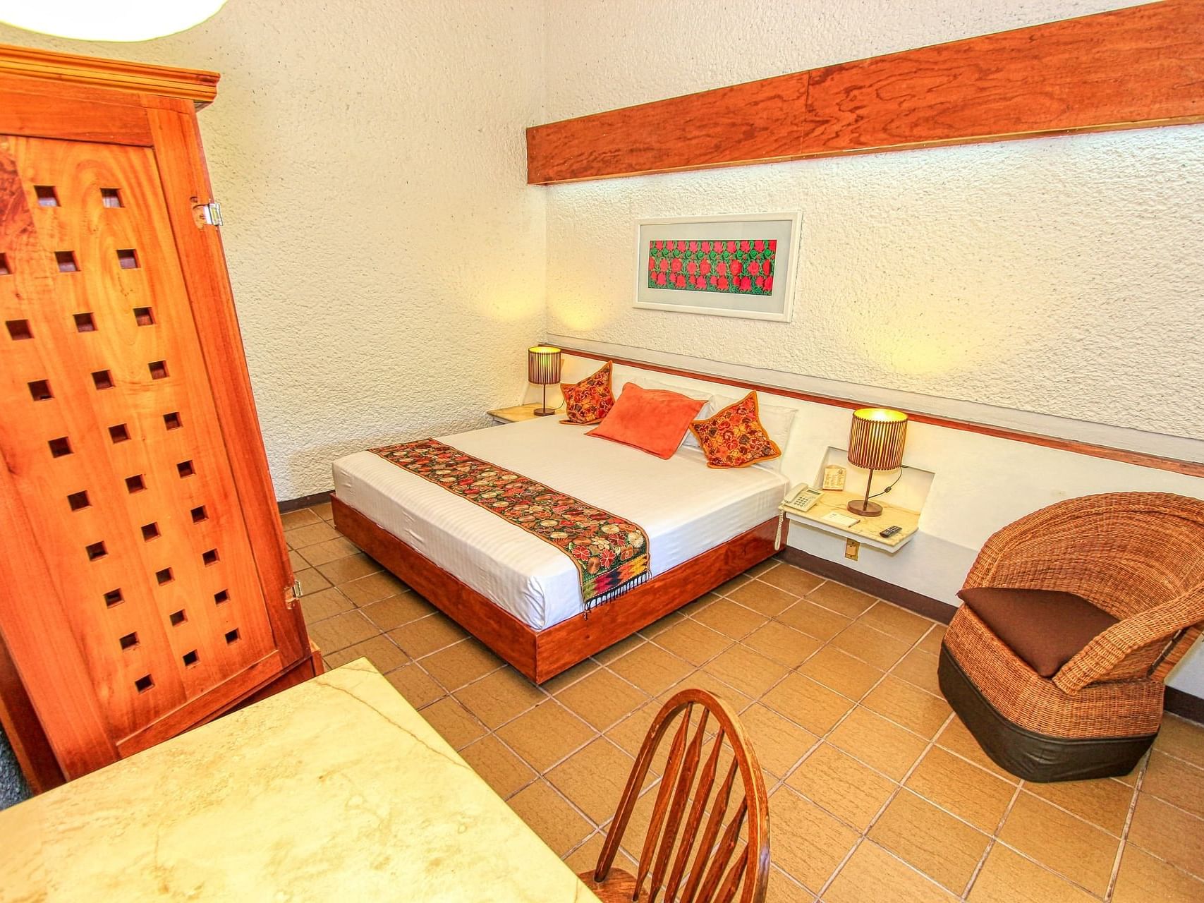 The bedroom arrangement in a room at Ciudad Real Palenque