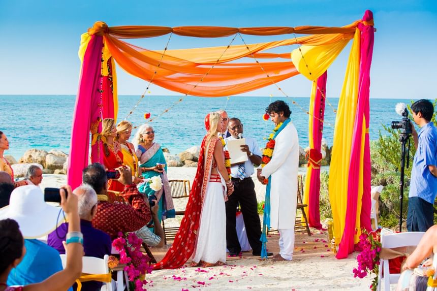Beach wedding celebration at The Somerset on Grace Bay