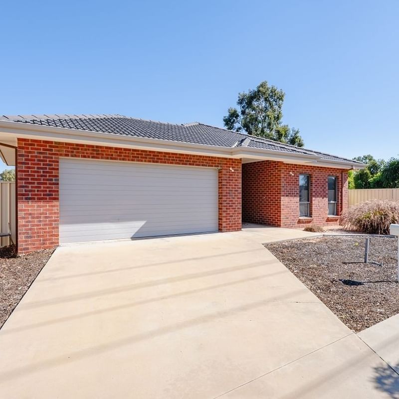 La Trobe University Regional Housing in Mildura with a driveway and fenced garden.