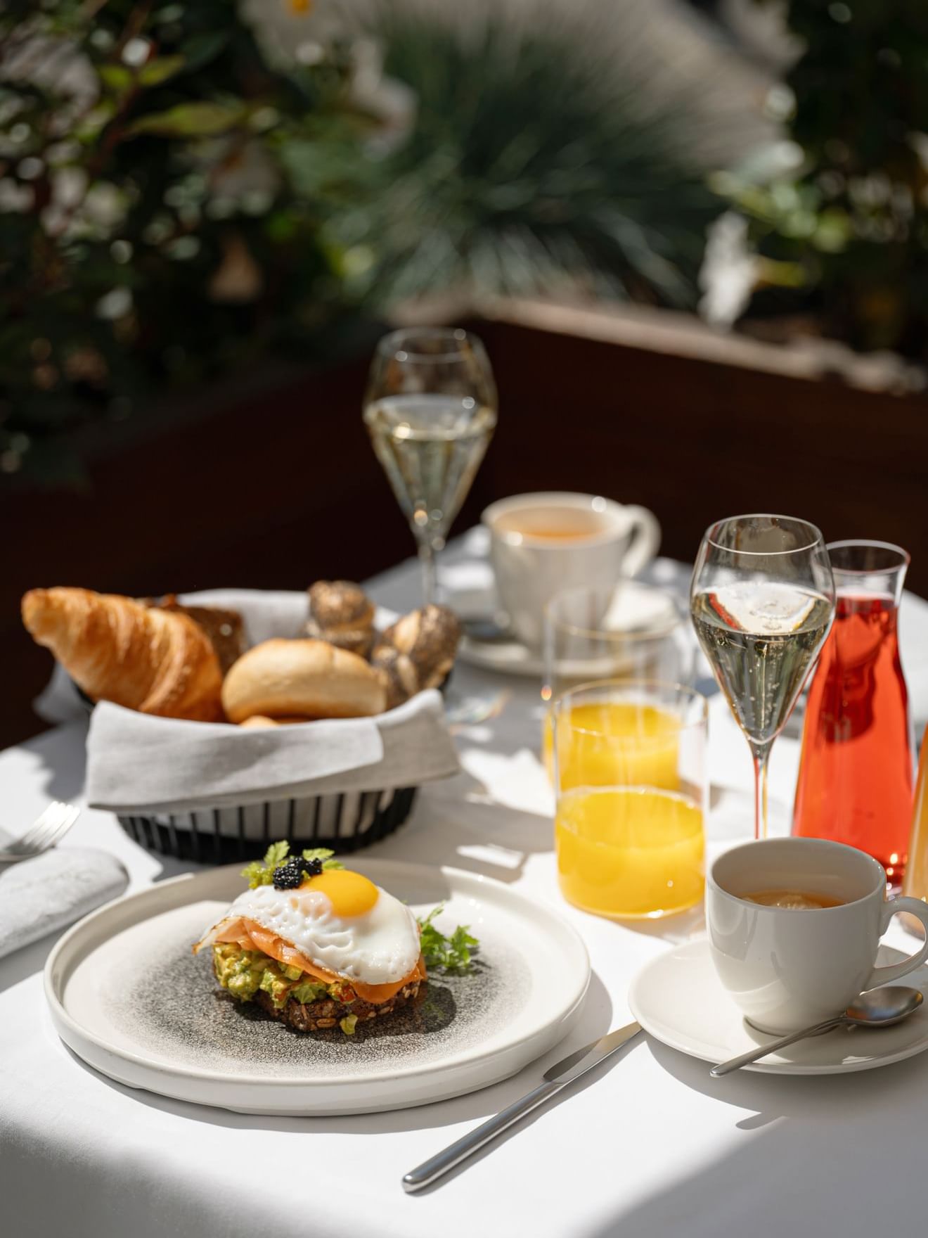 Breakfast table with pastries, champagne, juice served at Almanac Palais Vienna