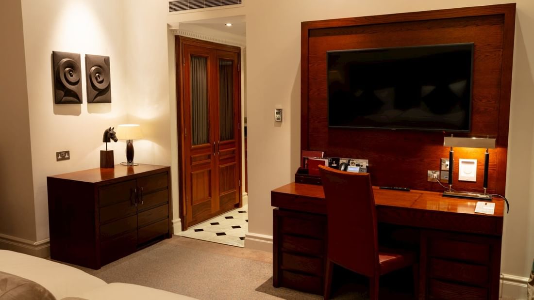 Desk & cabinet in Guest Single Room at Guoman Hotels