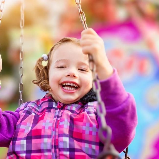 Girl enjoying ride at Buckingham Charter Fair