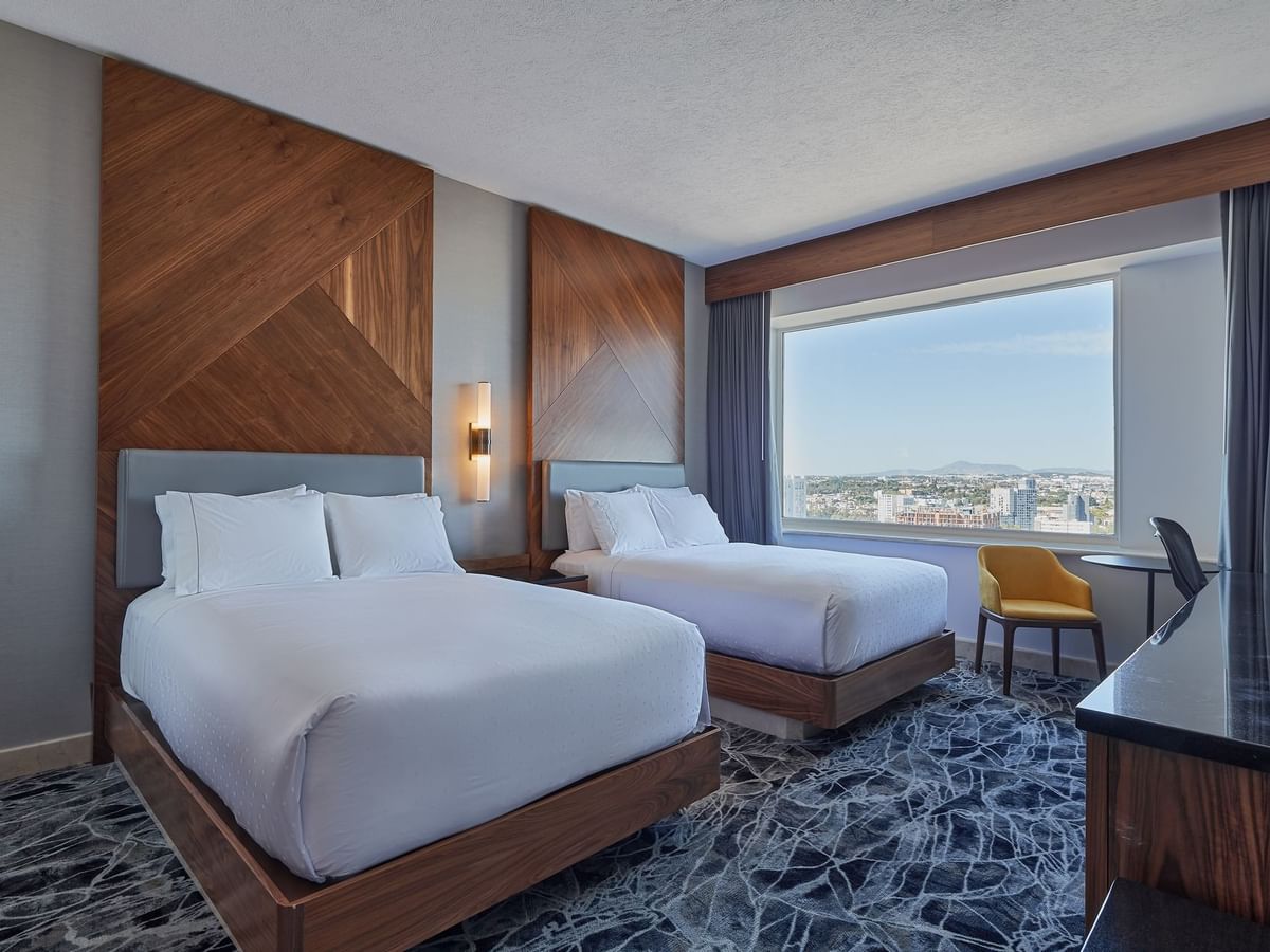 Interior of Deluxe Double bedroom at Grand Fiesta Americana