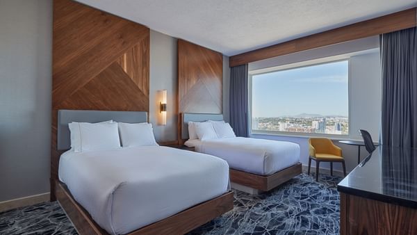 Interior of Deluxe Double bedroom at Grand Fiesta Americana