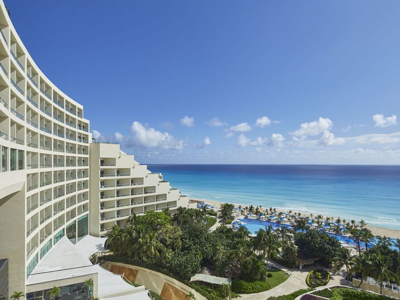 Panoramic view of the hotel exterior overlooking the sea near Live Aqua Cancún