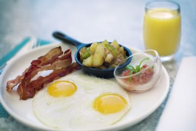Breakfast served in a restaurant at Windsong Resort On The Reef