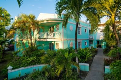 Exterior view of Gold Waters building with garden at Dover Beach Hotel