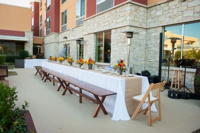 long table with bench seating set up outdoor