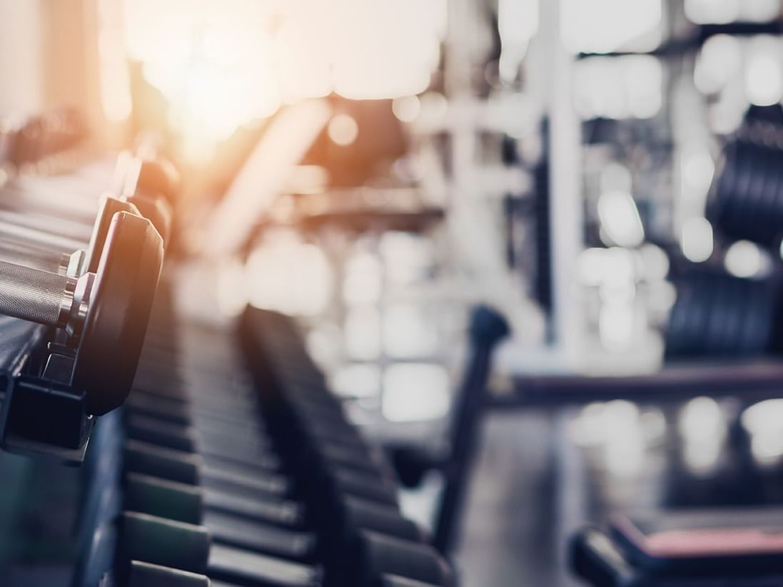 Fitness Center with weights and exercise machines at Henn Na Hotel New York