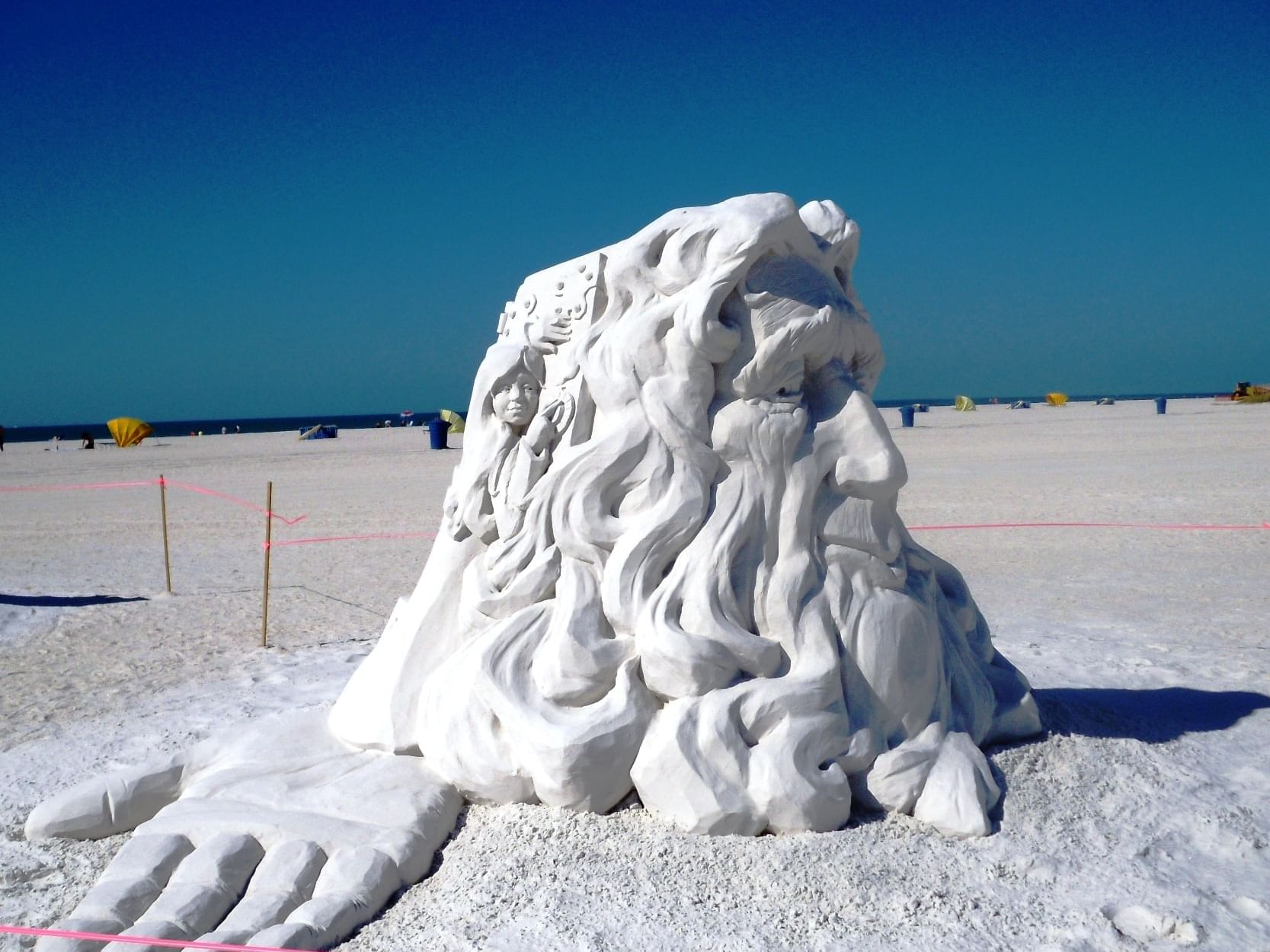 Close-up of a sand sculpture on the beach near Bilmar Beach Resort