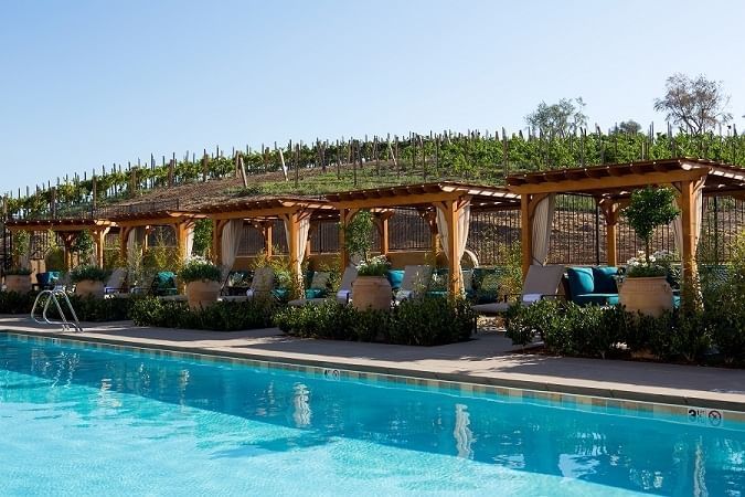 The pool and cabanas at Allegretto Vineyard Resort in Paso Roble