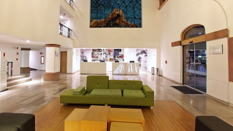 Interior of the reception and lobby area at Fiesta Inn