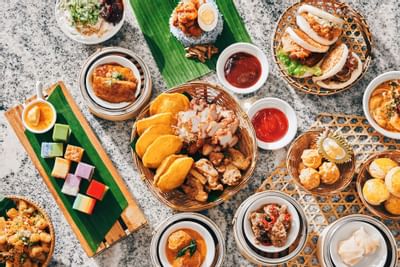 High-tea setup in Ellenborough Market Café at Paradox Singapore