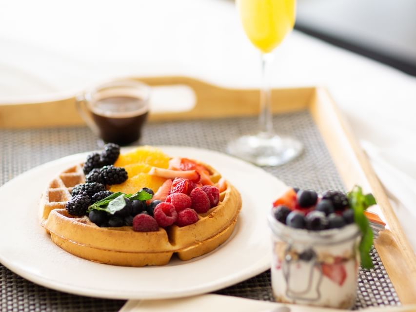 Waffle Dish Served With Drinks At Luxe Sunset Boulevard Hotel